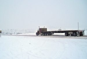 Flatbed truck in snow